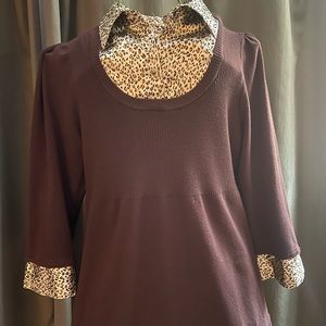 Lightweight brown sweater w/mock collar and cuffs in brown/tan/black pattern.